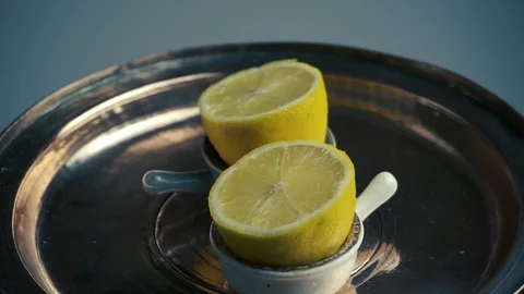 Half lemon citrus fruit on tray background Stock Footage 106532143