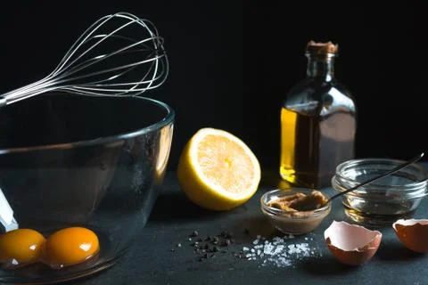 Half a lemon, eggs and shell, olive oil Foto stock