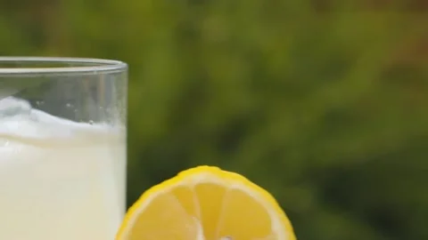Half of lemon moving along the table Stock Footage 142340987