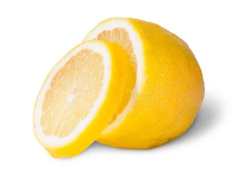 Half of a lemon with one slice Stock Photos