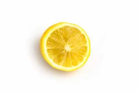Half a lemon on a white background isolate Stock Photos