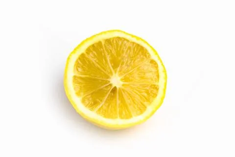 Half a lemon on a white background isolate Stock Photos