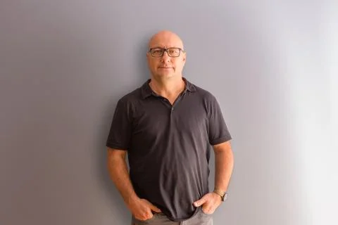 Half-length front portrait of bold man Stock Photos