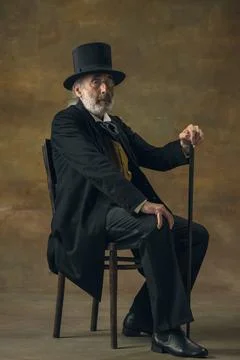 Half-length retro portrait of sad elderly gray-haired man, gentleman, aristocrat Stock Photos