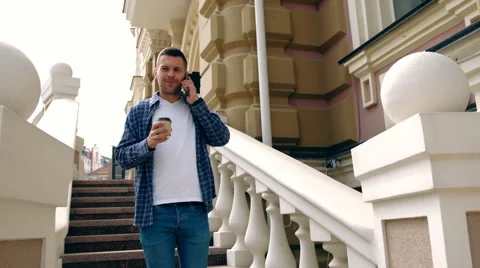 Half length of young handsome alternative dark model man walking using Stock Footage 62627938