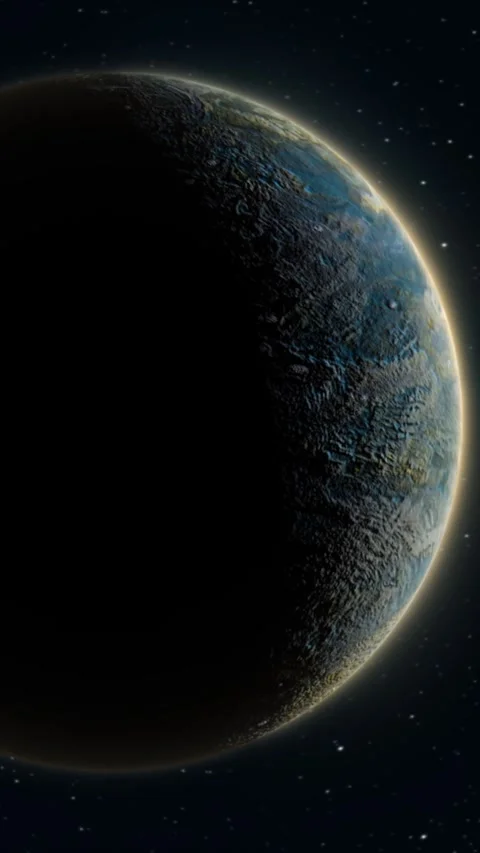 Half-lit rocky alien planet with cratered surface and glowing rim against a.. Stock Footage 336176690