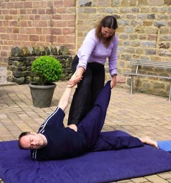 Half locust pose Stock Photos