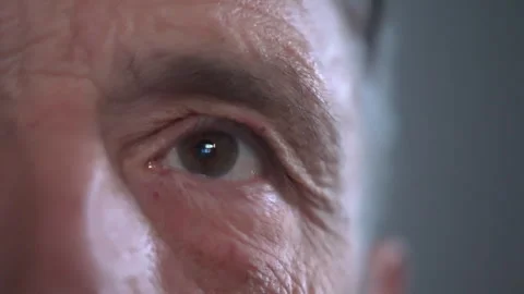 Half of a man's face looking at a screen Stock Footage 249505184