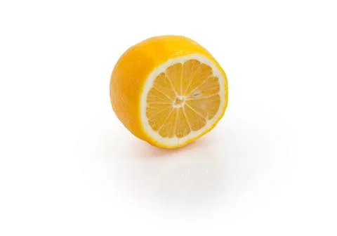 Half of Meyer lemon on a white background Stock Photos