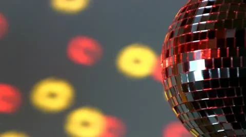 Half mirror ball; red and yellow light Stock Footage 10758435