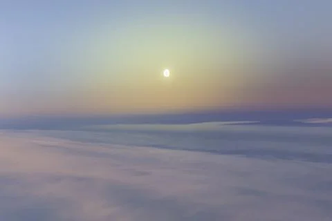Half Moon Above Pastel Cloudscape and Belt of Venus Stock-Fotos