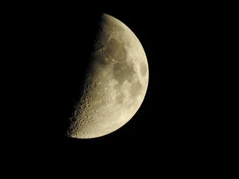 Half-moon and craters Stock Photos