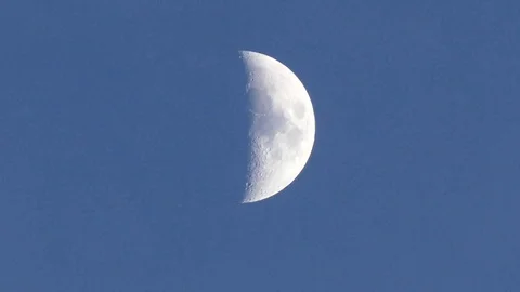 Half moon and moving clouds, cloud and moon in the blue sky, Stock Footage 121726748