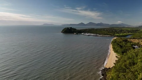 Half Moon Bay Beach and Roci Point, Cairns, Queensland, Australia: 4K Aerial Stock Footage 311141420