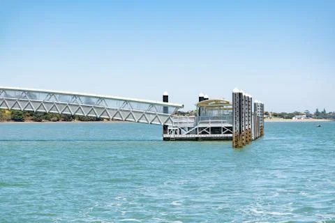 Half Moon Bay ferry floating jetty with metal pylons Stock Photos
