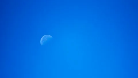 Half moon in blue sky 2 Видео 130881648