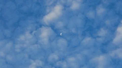 Half Moon in Cloudy Blue Sky 스톡 사진