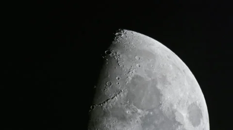 Half moon crossing showing off top craters HD Stock Footage 36766529