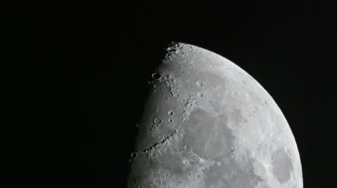 Half moon crossing showing off top craters 4K 스톡 동영상 36769878