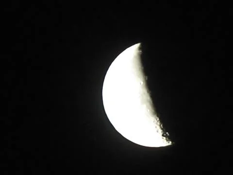 Half moon in the dark sky, close up of a half moon Stock Photos