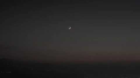 Half Moon Glowing in the Night Sky Stock Footage 321801575