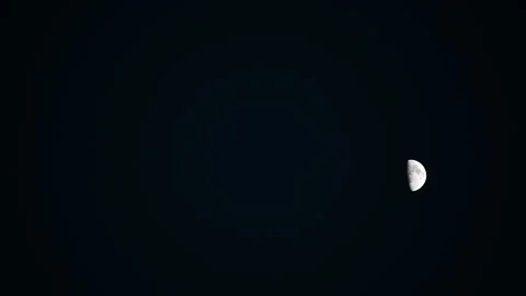 Half moon isolated against dark night sky Video stock 329205202