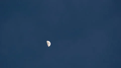 Half moon moving on dark sky. 4K Timelapse Stock Footage 58652883