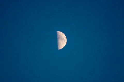 Half moon on the night sky Stock Photos
