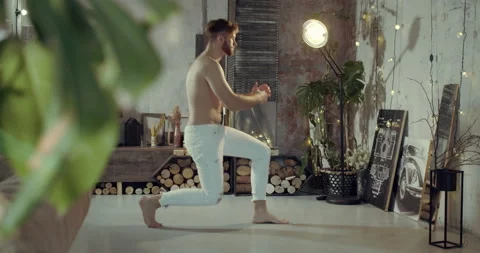 Half naked man is doing his morning routine. Stock Footage 135239015