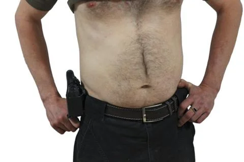 Half naked security man with a traumatic gun Stock Photos