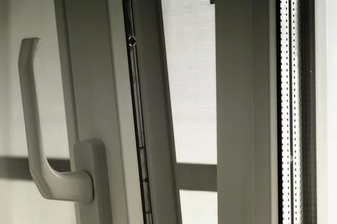 A half-open window Stock Photos