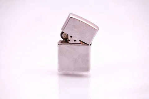 Half opened cigarette lighter. Stock Photos