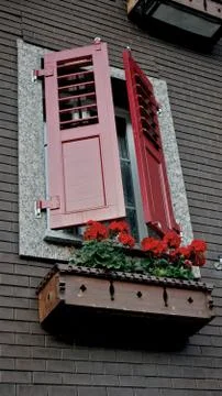 Half opened window in the first floor Stockfoto's