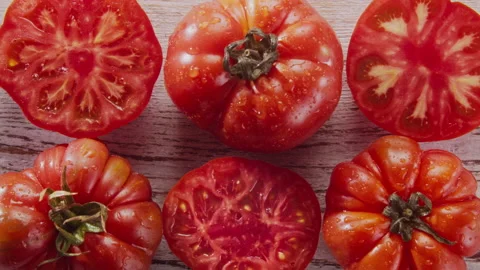 HALF OPENING OF TOMATOES STOP MOTION Stock Footage 133126304