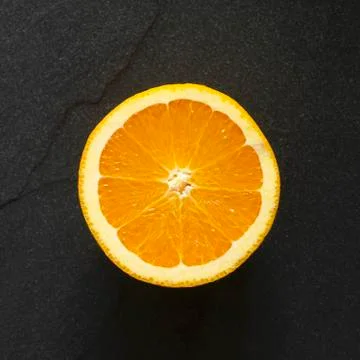 Half an orange from above Stock Photos