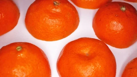 Half orange fruit fruits on rotating plate Stock Footage 110618075