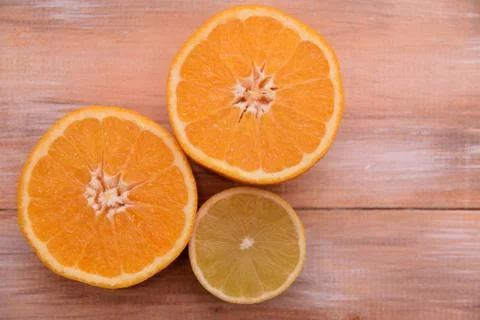Half oranges and lemon composition Stock Photos