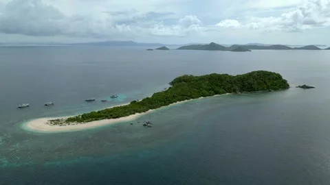 Half orbit around snake island in The Philippines during expedition to Coron Video stock 317025445
