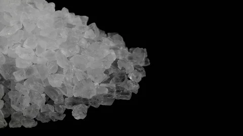 Half part of circle shaped heap of table salt crystals rotating  Stock-Footage 96989906