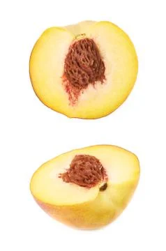 Half of a peach fruit isolated Stock Photos