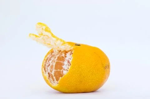 Half-peeled mandarin Stock Photos