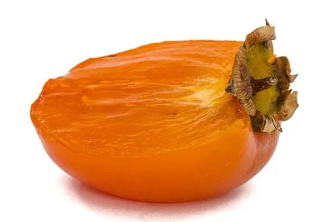 Half of persimmon fruit, isolated on white background Stock Photos