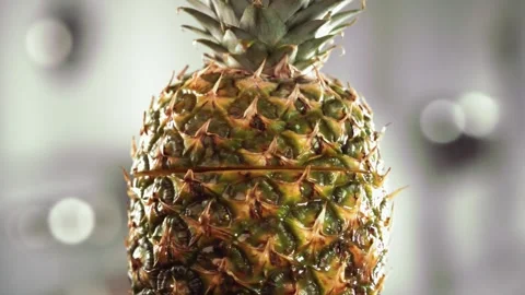 Half Pineapple falling and splashing on kitchen background. Food levitation 스톡 동영상 199017627