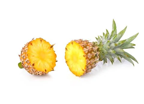 Half of pineapple isolated on white background. Stock Photos