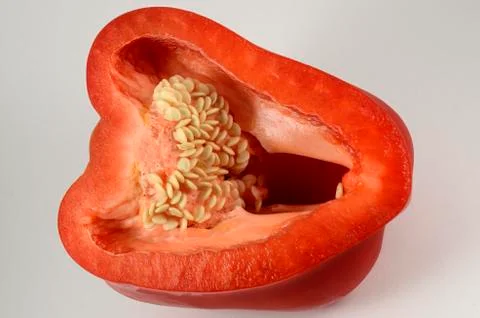 Half a pod of red pepper Stock Photos
