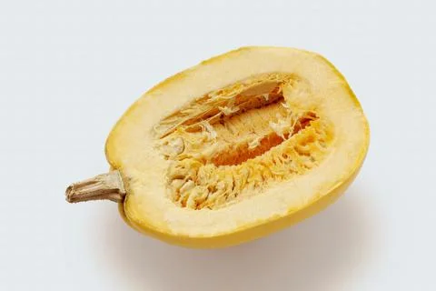 Half of pumpkin isolated on white Stock Photos