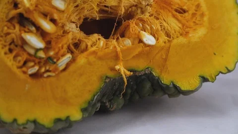 Half a pumpkin white on background Stock Footage 97805091