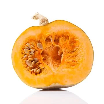 Half a pumpkin on a white background Stock Photos