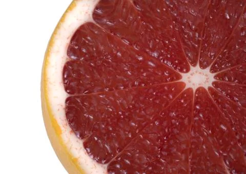 Half of Red Grapefruit isolated on white background. Stock Photos