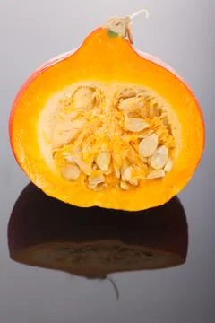 Half red kuri squash Stock Photos